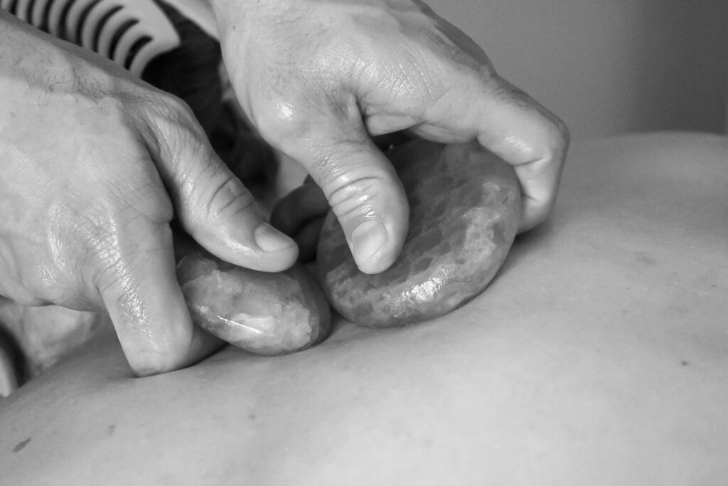 Hot stone massage Vitruvian Bodyworks DATS Wellness
